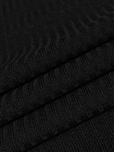 Macro detail of high-elasticity black ribbed knit fabric for women long sleeve hoodies