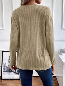 Detail view of khaki ribbed knit texture on back of loose long-sleeved women hoodie
