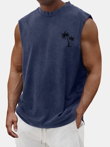 Close-up of ribbed crew neck and palm tree print on vintage washed navy cotton tank top