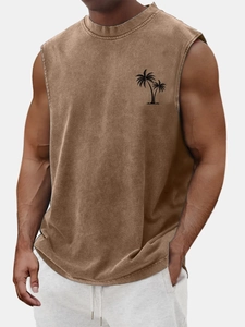 Detail of vintage washed brown cotton tank top with black palm tree print on the chest