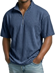 Detail of grey-blue corduroy polo shirt featuring a silver quarter-zip and ribbed texture