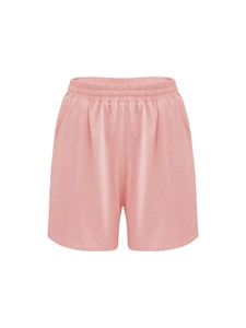 Detail of pink lounge shorts with elastic waistband and convenient side pockets