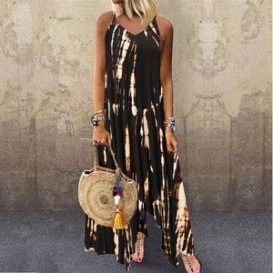 Detail of bohemian tie-dye maxi dress with irregular slit hem and sleeveless V-neck design