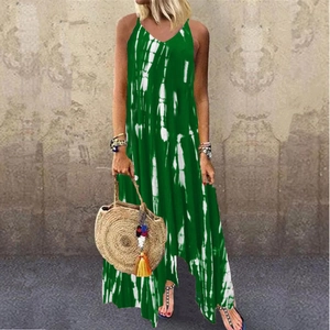 Green and white tie-dye maxi dress featuring a V-neck and asymmetrical hemline detail