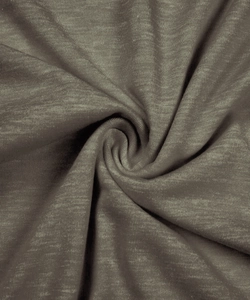 Detailed close-up of soft knit fabric texture with spiral drape in olive green color