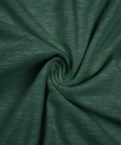 Detailed macro view of dark green heathered knit fabric with soft texture and drape