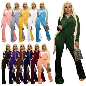 Matrix display of 11 velvet tracksuit colors showing zip-up tops and flared pants set