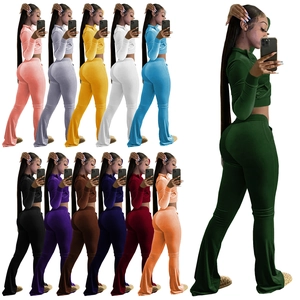 Detail showing 12 color options for the women's two-piece crop top and flare pants set