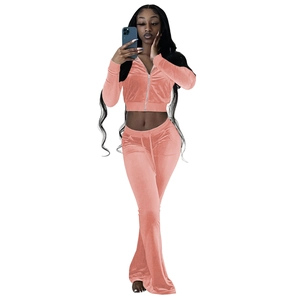 Detail of coral velvet tracksuit with cropped zip hoodie and flared drawstring trousers