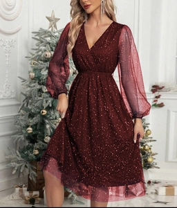 Elegant deep red V-neck sequined dress with sheer mesh sleeves and sparkly finish