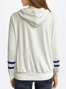 Detail view of white ribbed hoodie featuring navy blue double stripes on the casual sleeve cuffs