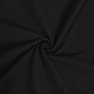 Detailed macro view of soft black knitted fabric texture with stretch for sports pants