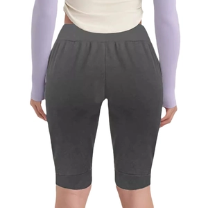 Women's slim fit dark grey high waisted athletic yoga shorts with functional side pockets