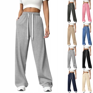Detail of adjustable drawstring waistband on high-waist wide-leg casual pants