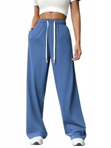 Women's high waist wide leg navy blue jogger pants with white drawstring detail