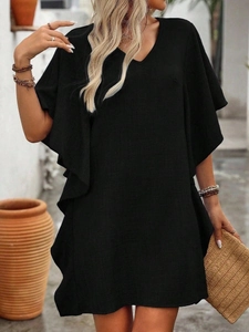 Detailed view of the black V-neck dress fabric texture and ruffled sleeve slit detail
