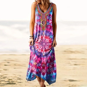 Ethnic sleeveless maxi dress with tie-dye print and metal ring V-neck on beach