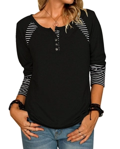 Close-up of black Henley neck with buttons and raglan striped sleeves on women top