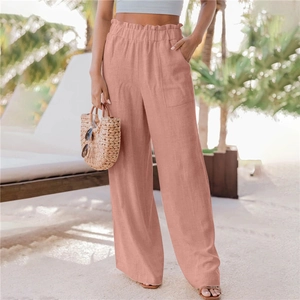 Pantaloni da donna a gamba larga a vita alta rosa salmone con balze elastiche e tasche laterali