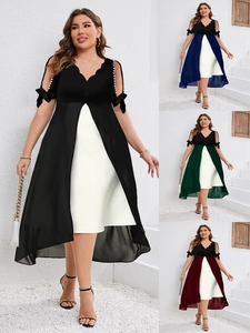 Detail showing off-the-shoulder sleeves with white pearl beads and black bow accents