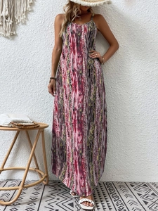 Close-up of pink and cream marble print maxi dress with sleeveless halter neck design