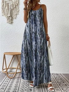 Bohemian style maxi dress with blue and white abstract print and thin straps