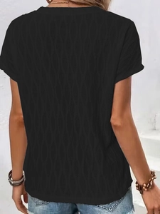 Women's black batwing sleeve t-shirt with waffle texture and crew neck, casual back view