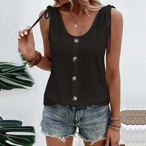Detail of black eyelet cotton tank top with shoulder bows and large front buttons