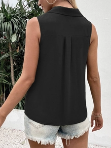 Back view of black sleeveless chiffon blouse showing collar and box pleat details