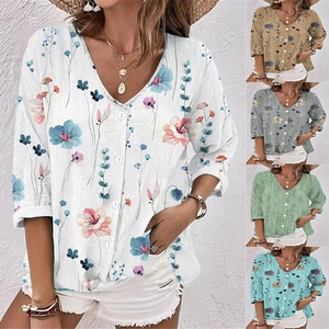 Detail of floral printed V-neck blouse fabric texture and optional color variants display