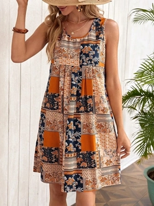 Detail of bohemian floral print on a sleeveless A-line dress with warm color tones