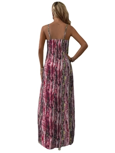 Women's boho maxi dress with pink striped print and thin straps shown from the back