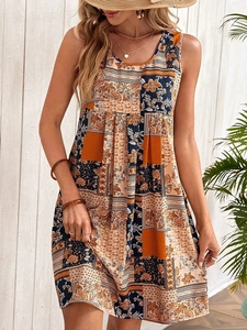 Detail of a sleeveless boho floral print dress with pleated waist and A-line silhouette