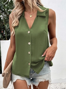 Detail of army green sleeveless chiffon blouse with V-neck and wooden buttons