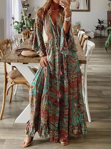Bohemian floral maxi dress with V-neck, flare sleeves and high waist for holiday style