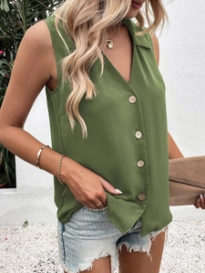 Detail of V-neck sleeveless chiffon shirt with natural wood buttons in grass green