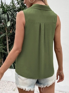Detail of army green sleeveless chiffon top with back box pleat design and turn-down collar