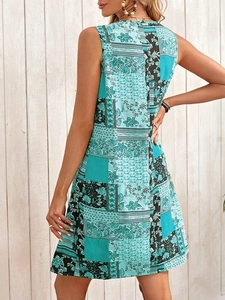 Close-up of bohemian floral print dress showing detailed fabric texture and back view