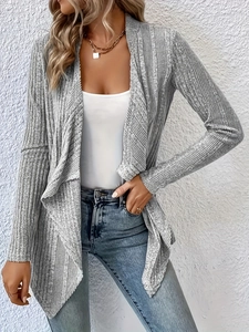 Detail of light grey knit cardigan showing vertical ribbed texture and open front design