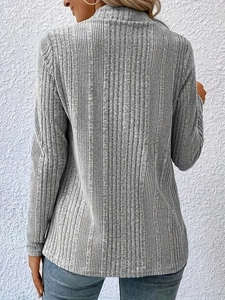 Detail view of gray long sleeve knit cardigan showing vertical striped texture on the back