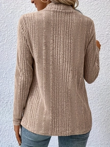 Detail of khaki ribbed knit texture on long sleeve top shown from a back view