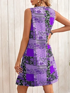 Detail view showing back of bohemian patchwork sleeveless dress with floral and polka dot prints