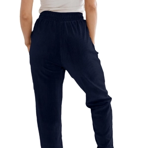 Navy blue corduroy wide leg pants featuring an elastic high waist and side pockets for women