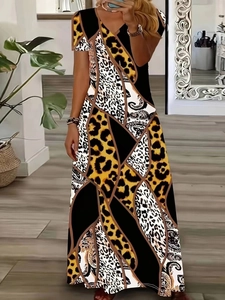 Women's V-neck maxi dress featuring leopard and paisley print patchwork style
