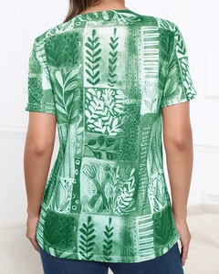 Rear view detail of women's short sleeve T-shirt with green botanical print texture