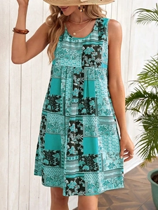 Sleeveless A-line summer dress with cyan and green floral print for holiday look