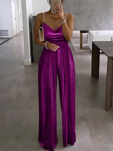 Elegant purple metallic wide-leg jumpsuit with pearl straps and V-neckline for women