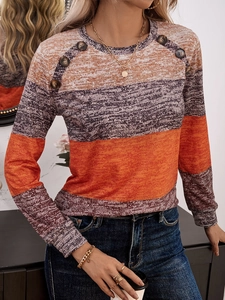 Women long sleeve knit top with color block stripes and decorative buttons on shoulder