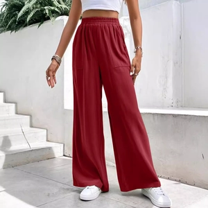 Pantaloni larghi casual rosso mattone da donna con vita alta elastica e tasche laterali