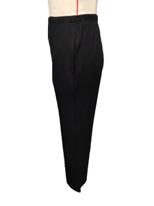Detail of black ribbed knit lounge pants with elastic waistband and straight leg design